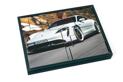 FRANZIS 67203 - Porsche Taycan Advent Calendar Frozen Blue, metal model kit in 1:24 scale, including LED showroom lighting and 52-page accompanying book