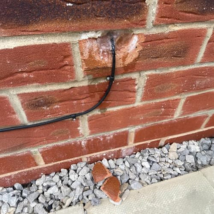 1STec 2xmust väliskate tellispuuriterale, kaablikanalite, voolikute, augu, korrastus-, madalpinge aiavalgustite ja elektriliinide kahjustustele