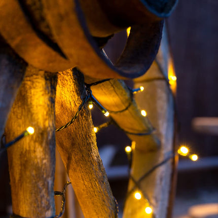 Idena 31339 - LED light chain with 360 LEDs in warm white, with remote control and sensor control, dimmer and memory settings, approx. 43.9 m long, as party decoration, Christmas decoration and for weddings