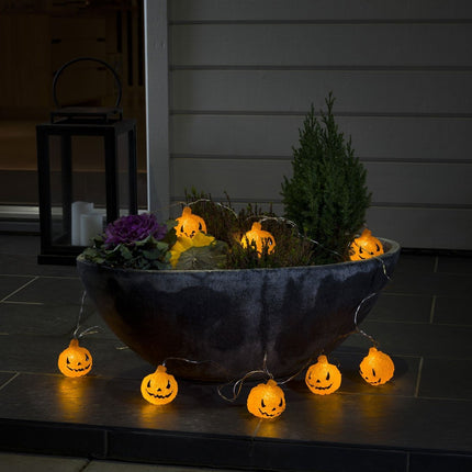 Konstsmide 6138-103 LED decorative light chain with acrylic pumpkins / for outdoor use (IP44) / VDE tested / Battery operated: 4xAA 1.5V (excl.) / 6h timer / 16 warm white diodes / transparent cable, red