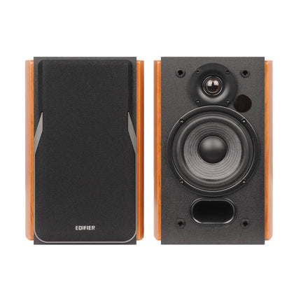EDIFIER Studio R1380T 2.0 riiulikõlarisüsteem (42 vatti) ehtsast puidust (MDF) korpuses. Kaks LINE IN-ühendust. Infrapuna-kaugjuhtimispult ja külgmised juhtnupud bassi, kõrgete helitugevuse ja muude helitugevuse jaoks.