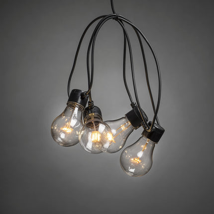 Konstsmide LED õlleaia kett, läbipaistev, 10 läbipaistvat pirni / 80 merevaigukollast dioodi, 24V väline trafo, must kaabel - 2378-800, merevaigukollane