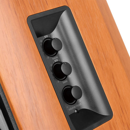 EDIFIER Studio R1380T 2.0 riiulikõlarisüsteem (42 vatti) ehtsast puidust (MDF) korpuses. Kaks LINE IN-ühendust. Infrapuna-kaugjuhtimispult ja külgmised juhtnupud bassi, kõrgete helitugevuse ja muude helitugevuse jaoks.