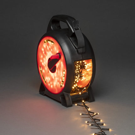 Konstsmide Micro LED Compactlights valguskett kaablirulliga, must-punane, 400 merevaigukollast dioodi, 30V väline trafo, 6W, must kaabel - 3844-800
