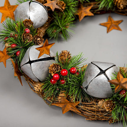 Christmas wreath with silver bells, stars, pine cones, berries, leaves, for outdoor Christmas, home, office, mantel, decorations