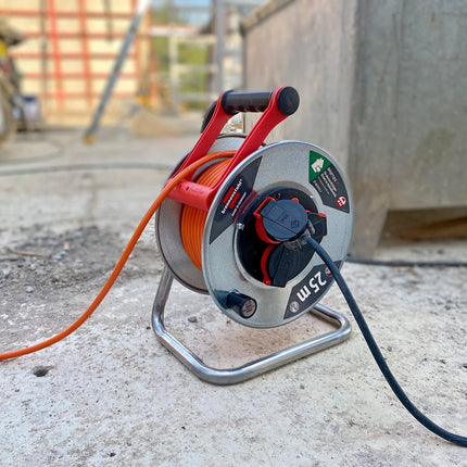 Brennenstuhl Garant S V2 IP44 cable reel (25m cable in orange, Made in Germany, IP44) and Brennenstuhl Safe-Box Big IP44 (protective box for extension cables)
