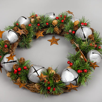 Christmas wreath with silver bells, stars, pine cones, berries, leaves, for outdoor Christmas, home, office, mantel, decorations