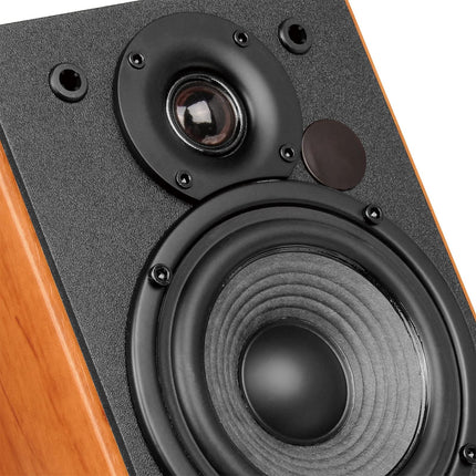 EDIFIER Studio R1380T 2.0 riiulikõlarisüsteem (42 vatti) ehtsast puidust (MDF) korpuses. Kaks LINE IN-ühendust. Infrapuna-kaugjuhtimispult ja külgmised juhtnupud bassi, kõrgete helitugevuse ja muude helitugevuse jaoks.