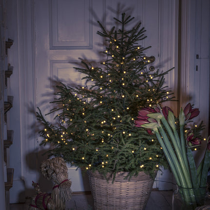Konstsmide LED tree skirt with ring Ø 11, with globes, 5 strands of 50 diodes each, pre-assembled, 250 amber diodes, 30V internal transformer, green cable - 6369-820