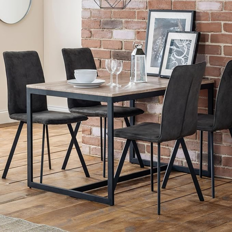 The Julian Bowen Tribeca Dining Table in Black/Sonoma Oak is a stylish and practical centrepiece in your dining room
